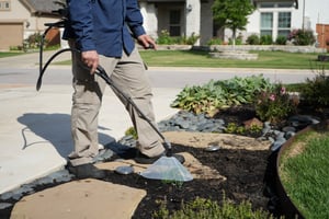 Tech Spraying Flower Bed