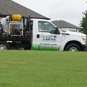 Lawn care truck parked at a residential property in Euless, Texas