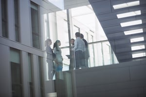 businesspeople-interacting-inside-office-building