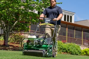lawn receiving core aeration services in Lowell