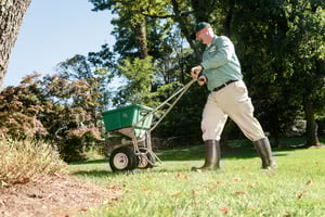 weed control and fetilizer being spread on Lowell lawn